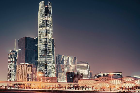 KAFD World Trade Center and its surrounding towers at night